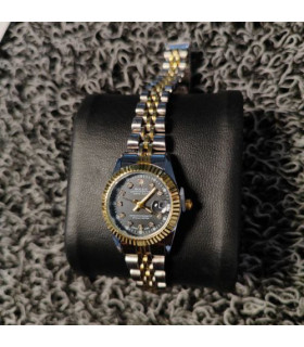 ساعت مدل رولکس زنانه رنگ مشکی بند طلایی نقره ای کد 419